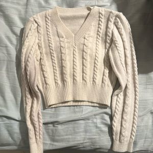 White sweater top that is a size S